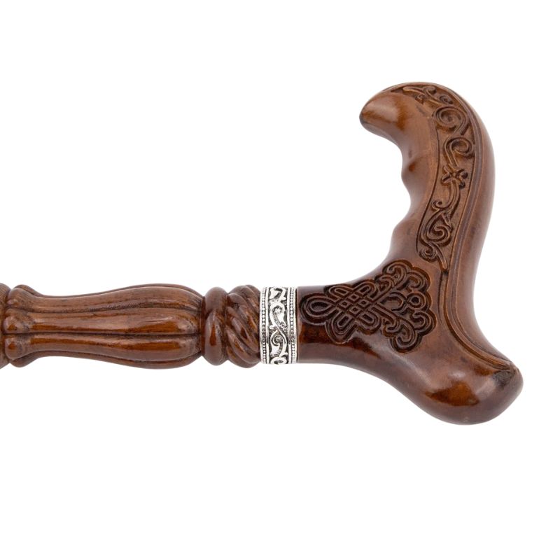 antique style carved wooden walking cane - shown in hand
