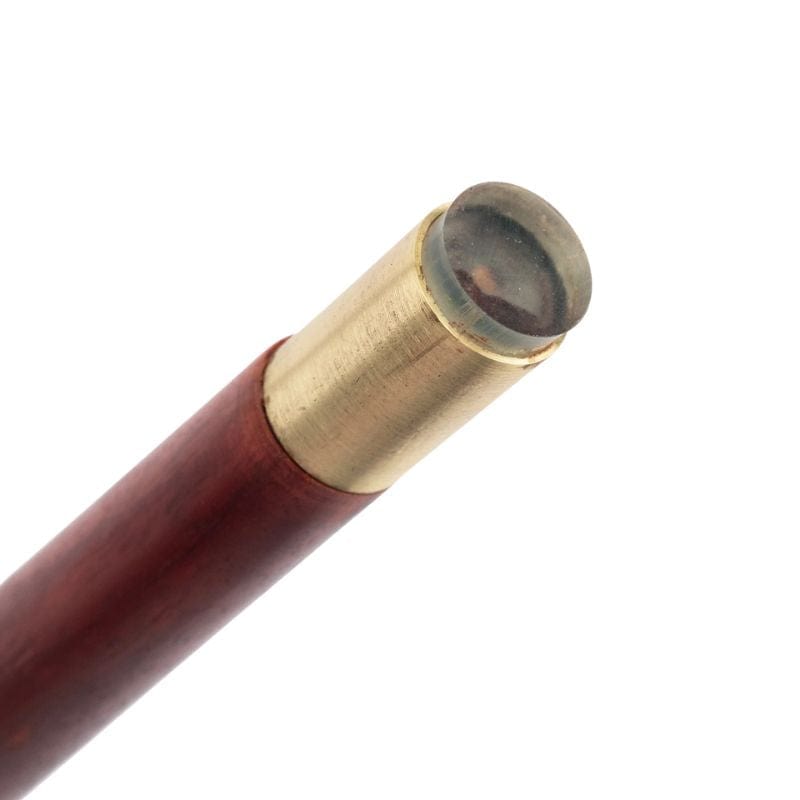carved wooden walking stick with cork grip - shown in hand