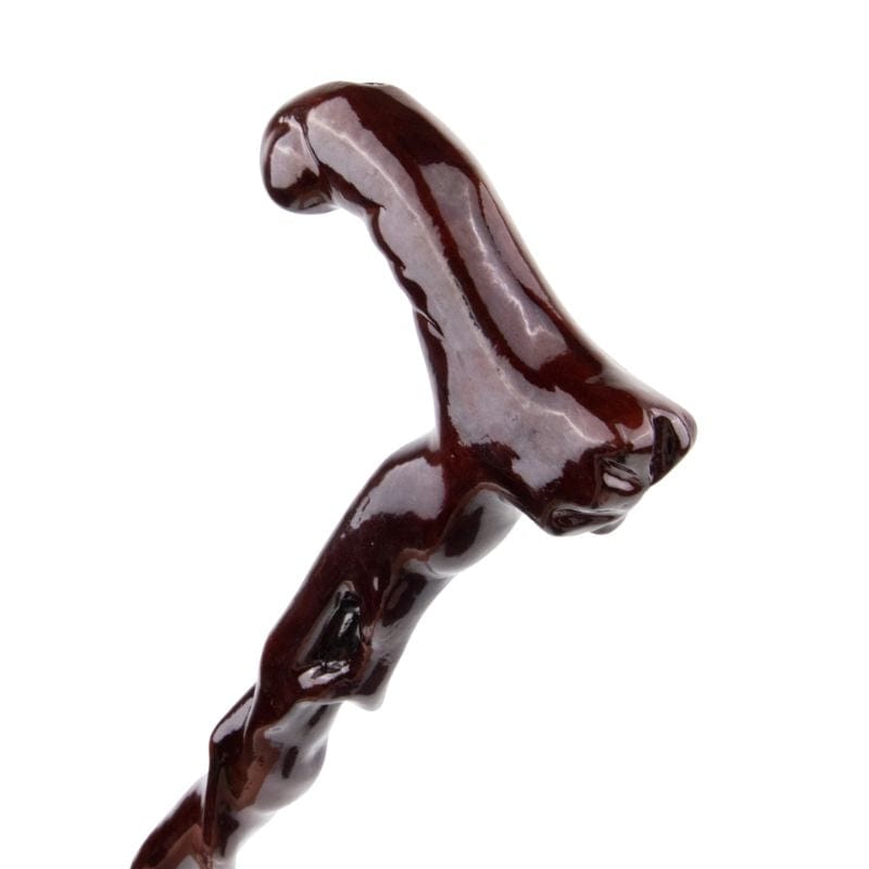 curved wooden walking cane with ergonomic grip - pommel detail