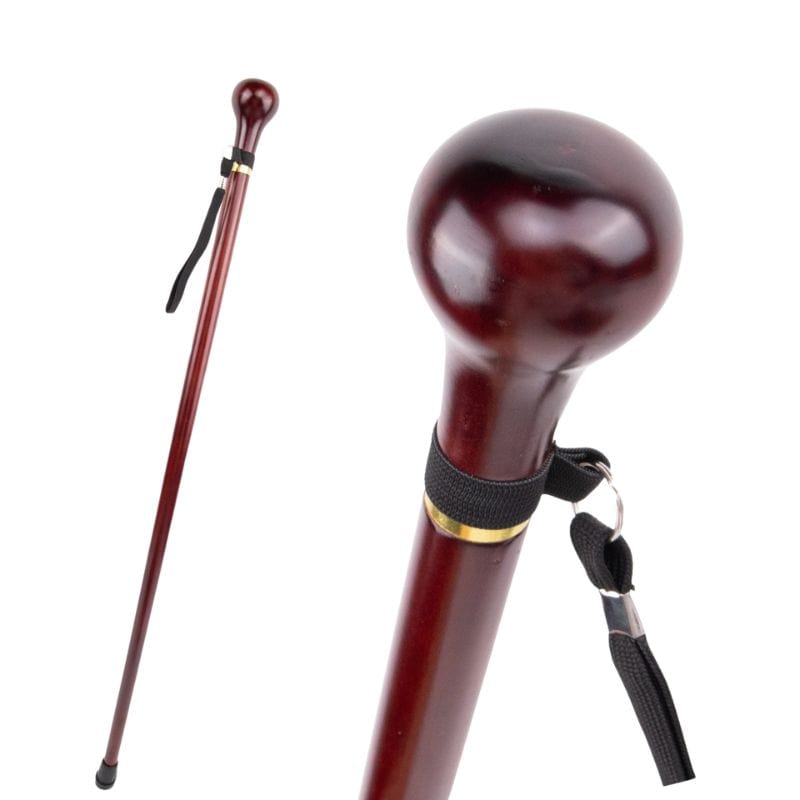 handcrafted wooden walking cane with cork handle - close-up view
