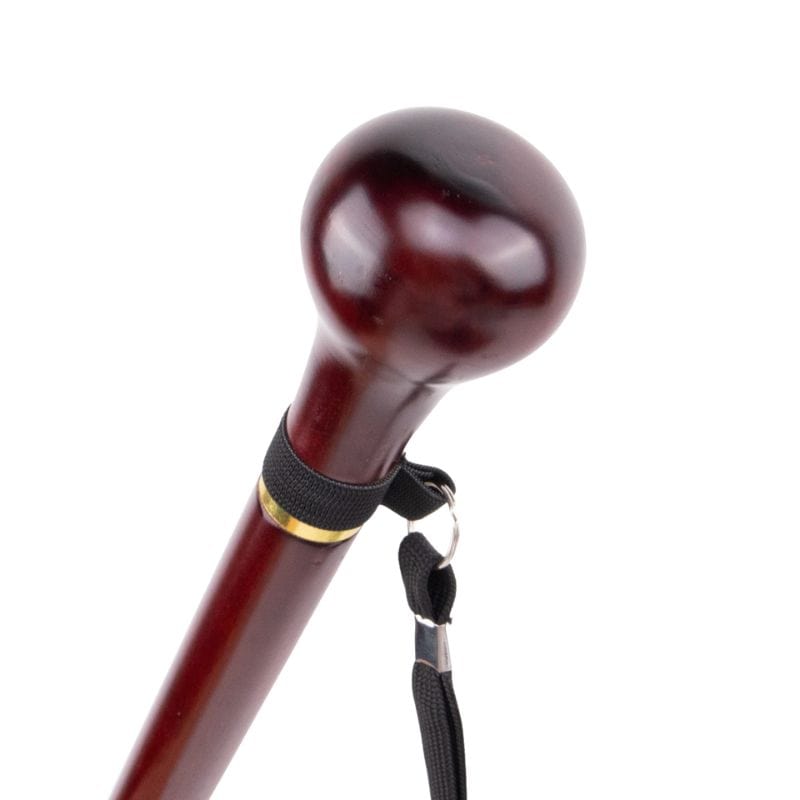 handcrafted wooden walking cane with cork handle - pommel detail