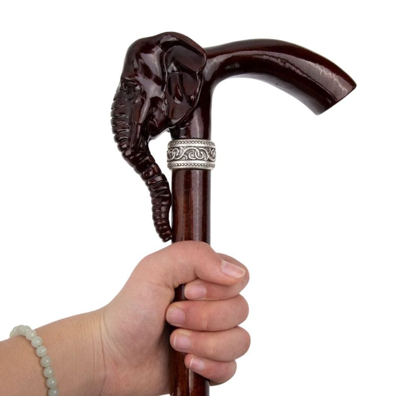 elephant head wooden walking cane - shown in hand